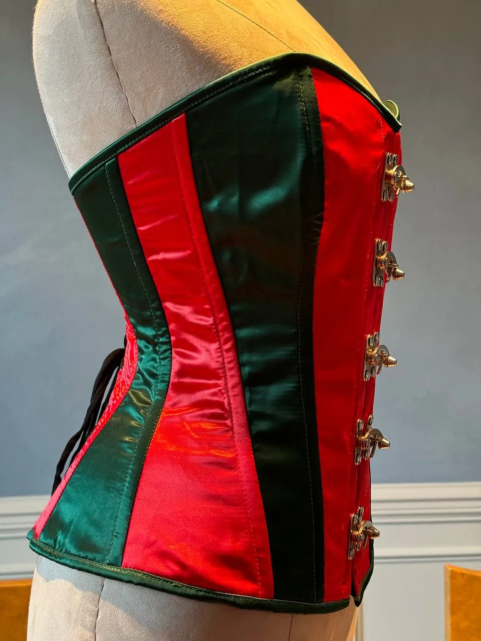 Overbust red and green satin in Santa style with steampunk closure hooks in the front. Corset is made personally according to your measurements.