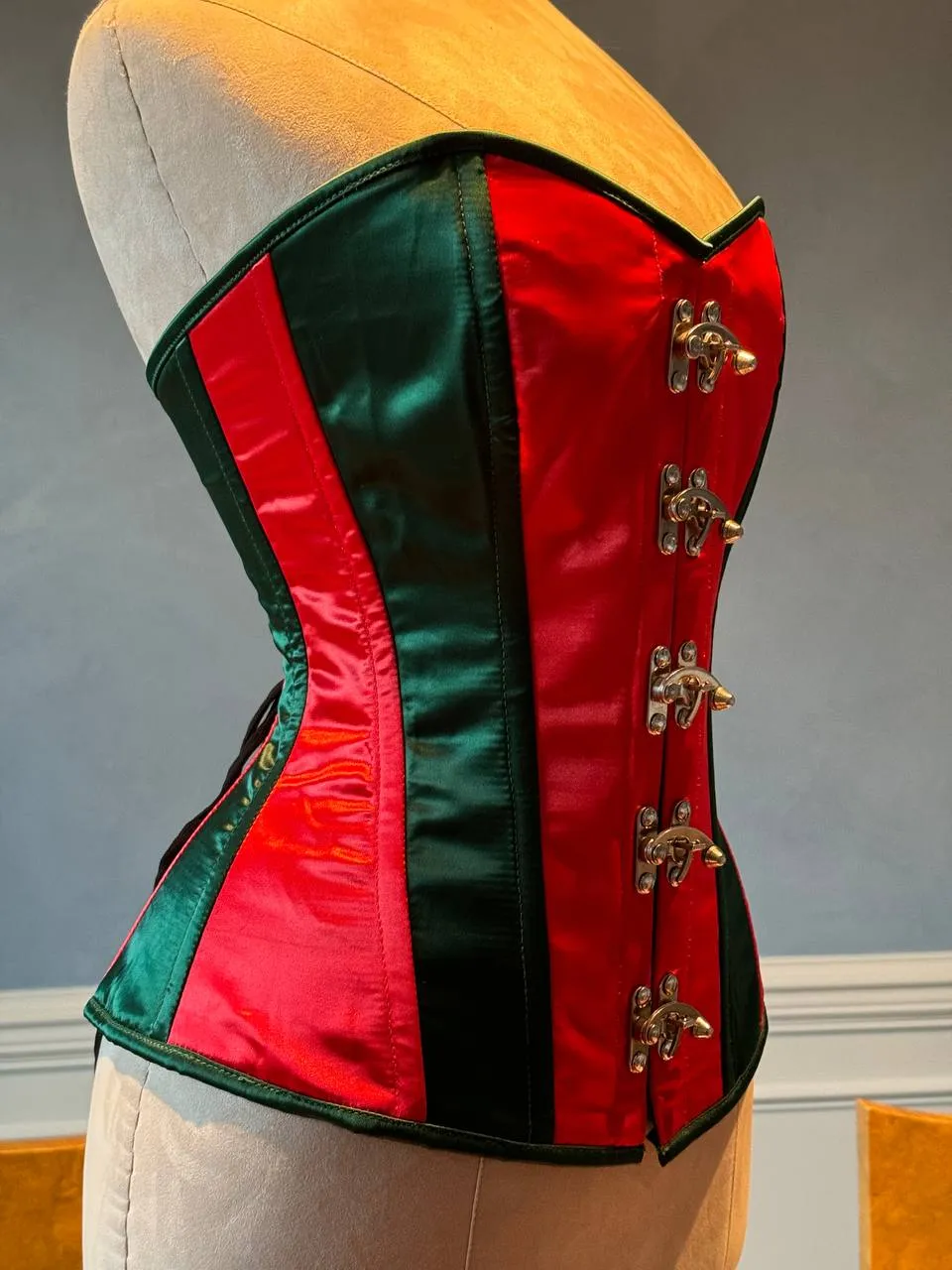 Overbust red and green satin in Santa style with steampunk closure hooks in the front. Corset is made personally according to your measurements.