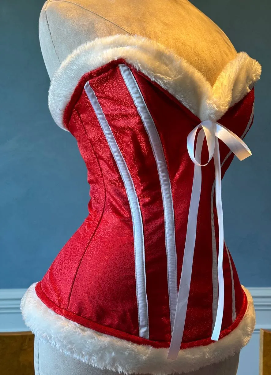 Red satin with white bones and fur affordable Santa Christmas corset. Corset is made personally according to your measurements.