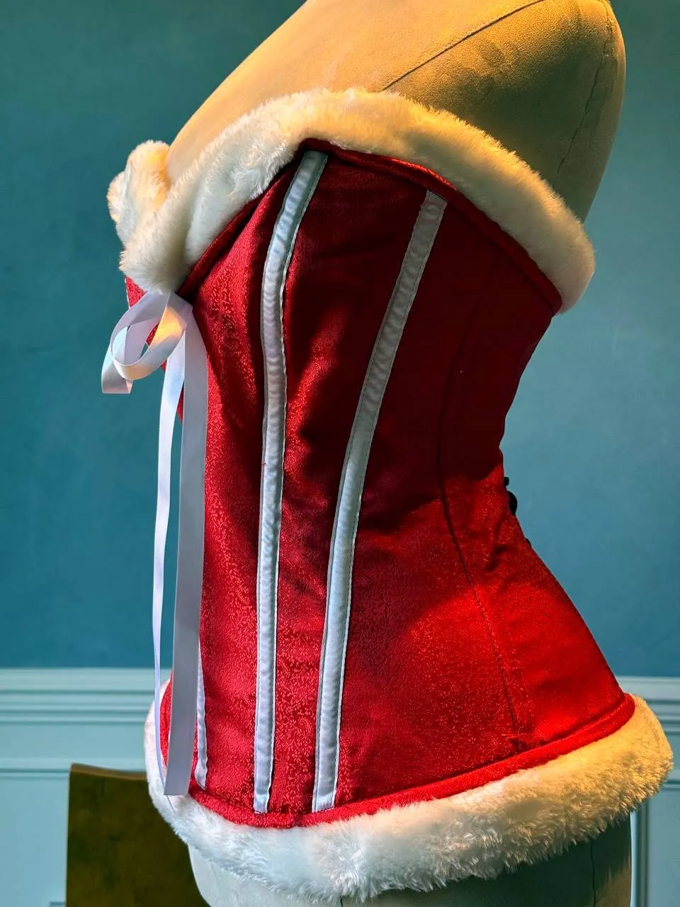 Red satin with white bones and fur affordable Santa Christmas corset. Corset is made personally according to your measurements.